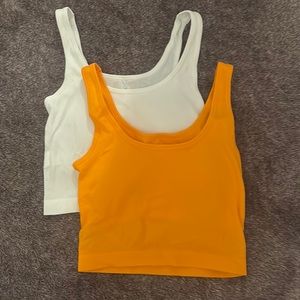 Set of orange and white crop tops